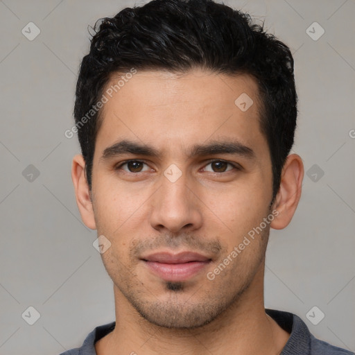 Joyful white young-adult male with short  black hair and brown eyes