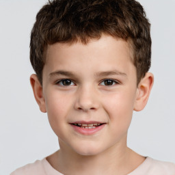 Joyful white child male with short  brown hair and brown eyes