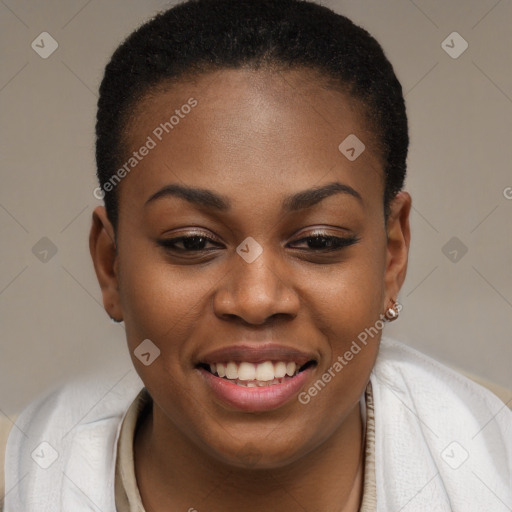 Joyful black young-adult female with short  brown hair and brown eyes