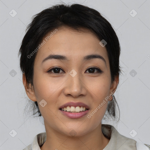 Joyful asian young-adult female with medium  black hair and brown eyes