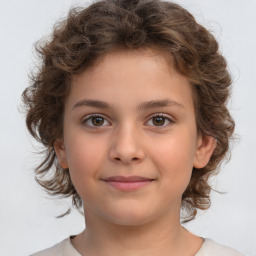 Joyful white child female with medium  brown hair and brown eyes