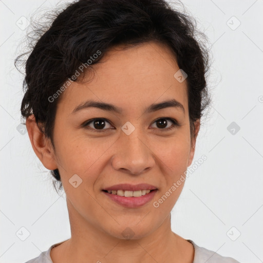 Joyful latino young-adult female with short  brown hair and brown eyes