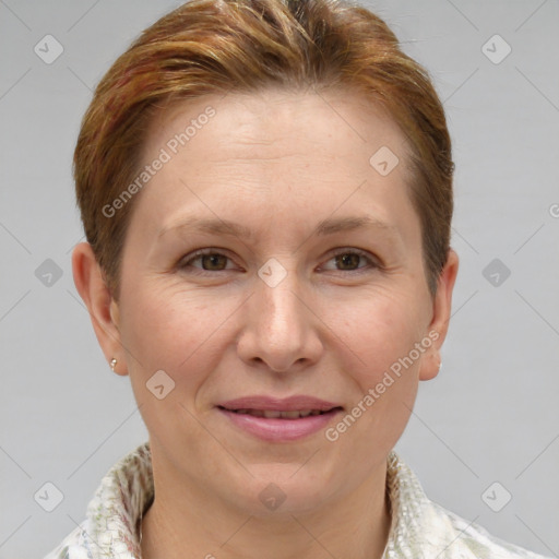 Joyful white adult female with short  brown hair and grey eyes