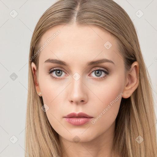 Neutral white young-adult female with long  brown hair and brown eyes