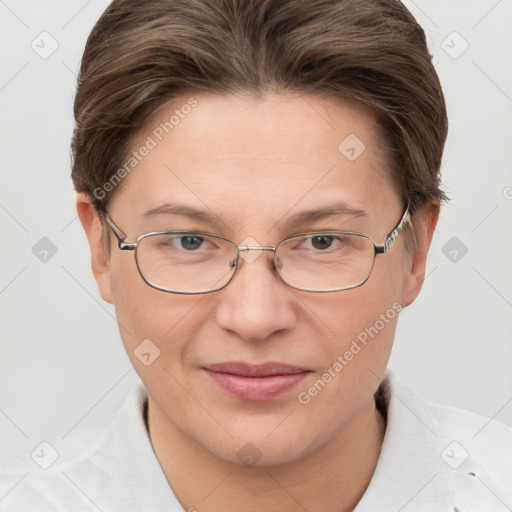 Joyful white adult female with short  brown hair and grey eyes