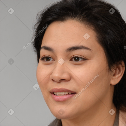 Joyful white young-adult female with medium  brown hair and brown eyes