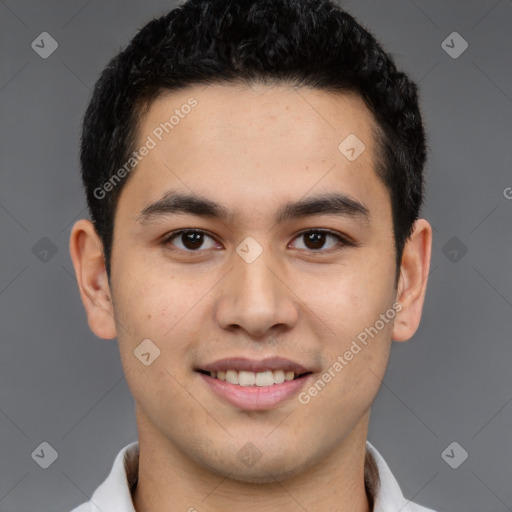 Joyful latino young-adult male with short  brown hair and brown eyes