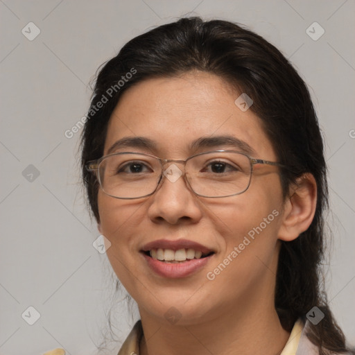 Joyful white adult female with medium  brown hair and brown eyes