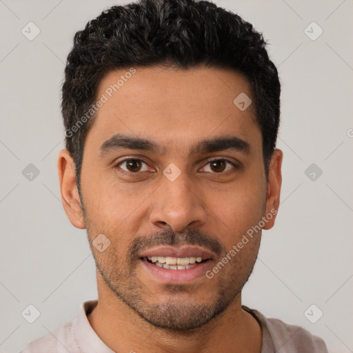 Joyful white young-adult male with short  black hair and brown eyes