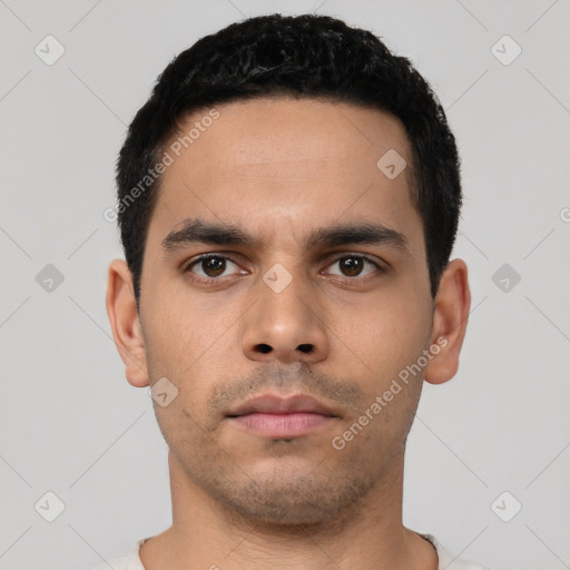 Neutral latino young-adult male with short  black hair and brown eyes