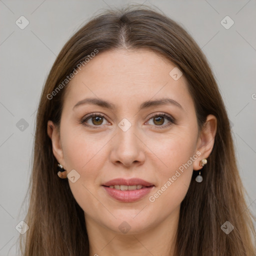 Joyful white adult female with long  brown hair and brown eyes