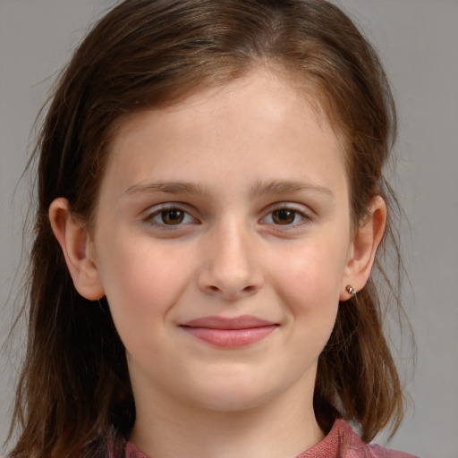 Joyful white child female with medium  brown hair and brown eyes