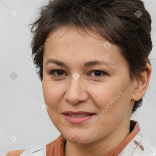 Joyful white adult female with short  brown hair and brown eyes