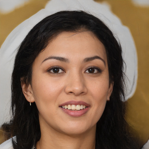 Joyful latino young-adult female with medium  brown hair and brown eyes