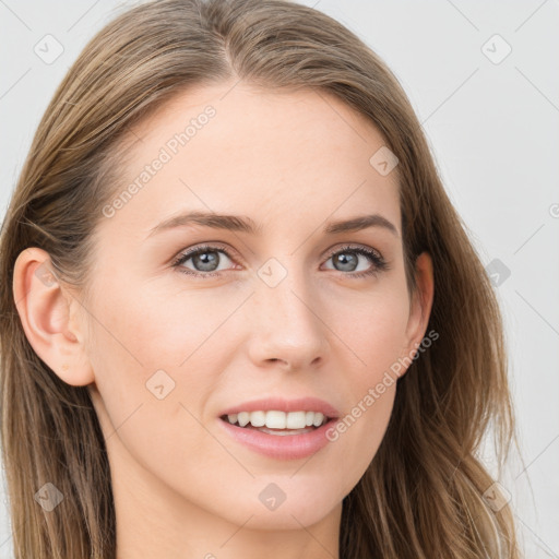 Joyful white young-adult female with long  brown hair and blue eyes