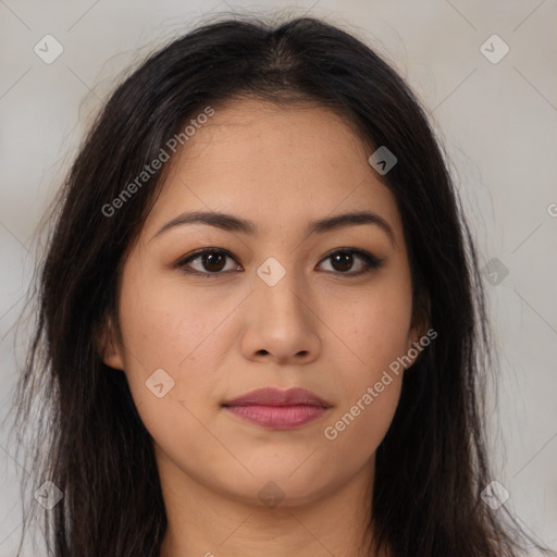 Joyful latino young-adult female with long  brown hair and brown eyes