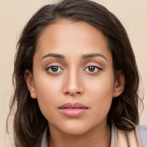 Neutral white young-adult female with long  brown hair and brown eyes