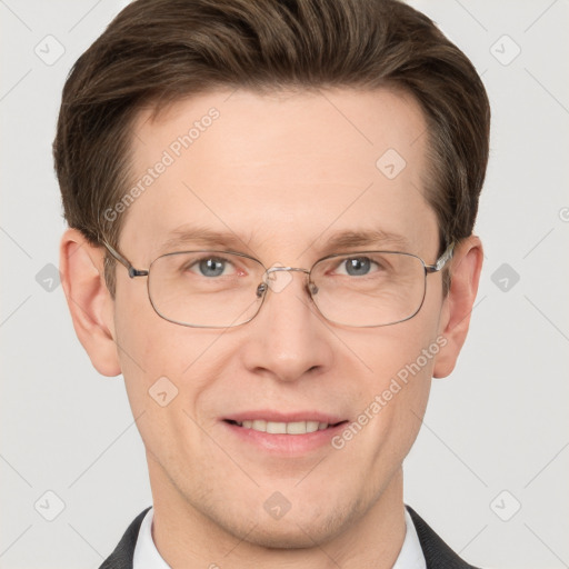 Joyful white adult male with short  brown hair and grey eyes