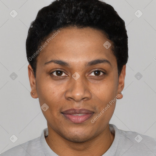 Joyful black young-adult female with short  black hair and brown eyes