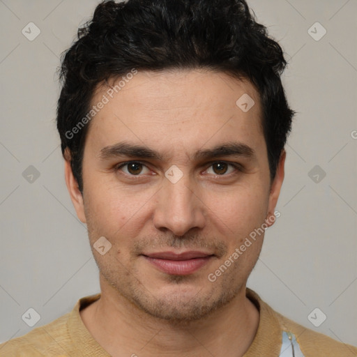 Joyful white young-adult male with short  black hair and brown eyes