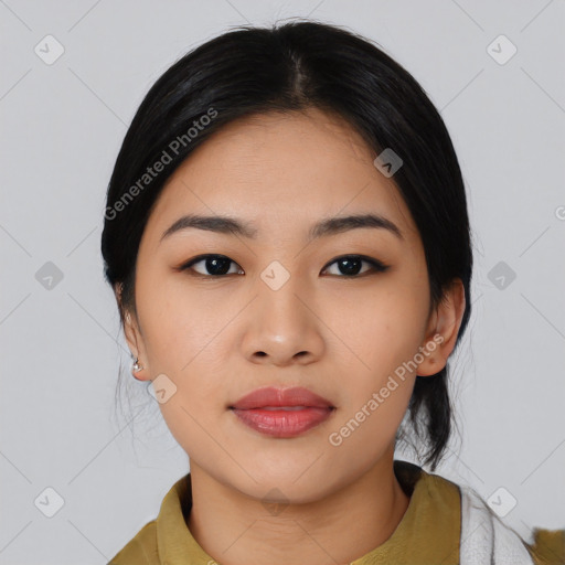 Joyful asian young-adult female with medium  black hair and brown eyes