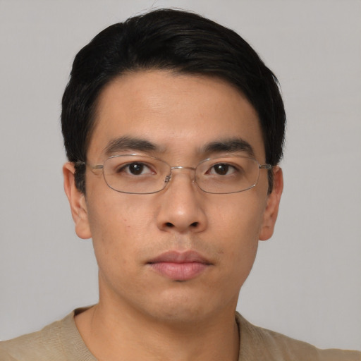 Neutral asian young-adult male with short  black hair and brown eyes