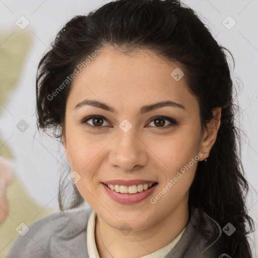 Joyful latino young-adult female with medium  brown hair and brown eyes