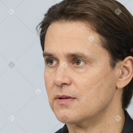 Neutral white adult male with short  brown hair and brown eyes