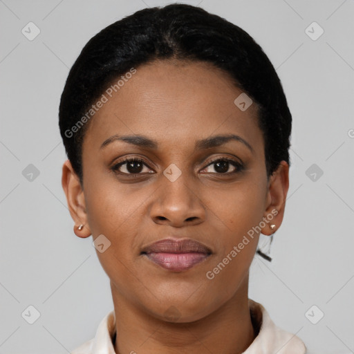 Joyful latino young-adult female with short  black hair and brown eyes