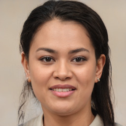 Joyful white young-adult female with medium  brown hair and brown eyes