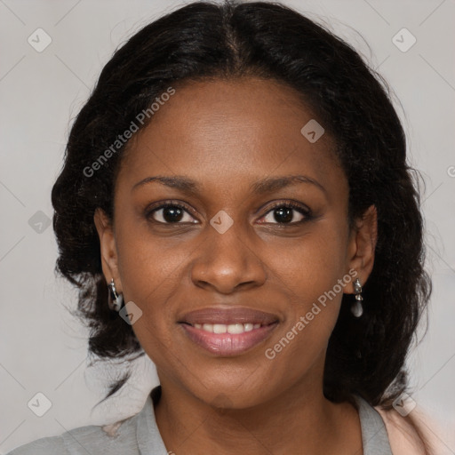 Joyful black young-adult female with medium  brown hair and brown eyes