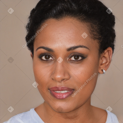 Joyful black young-adult female with short  brown hair and brown eyes