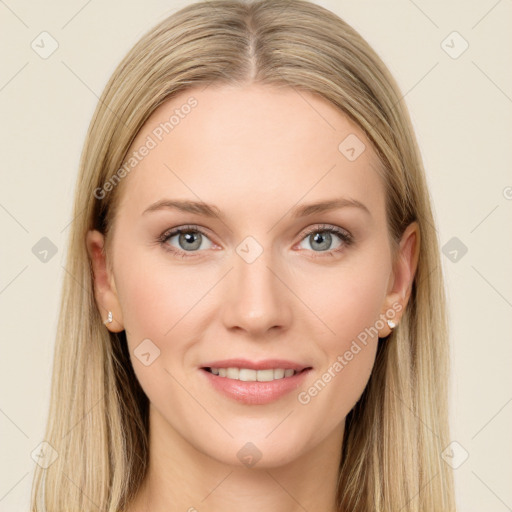 Joyful white young-adult female with long  brown hair and blue eyes