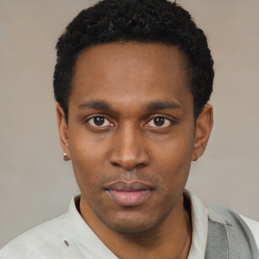 Neutral black young-adult male with short  black hair and brown eyes