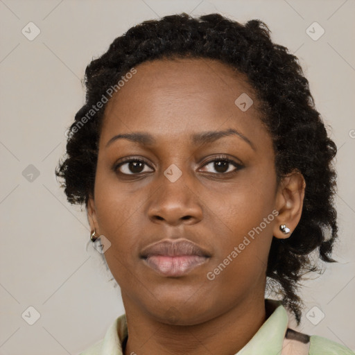 Neutral black young-adult female with medium  brown hair and brown eyes