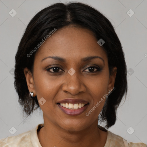 Joyful black young-adult female with medium  brown hair and brown eyes