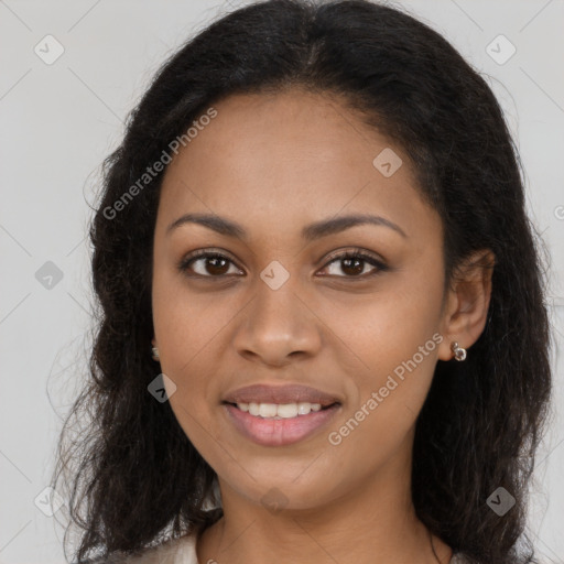 Joyful latino young-adult female with long  brown hair and brown eyes