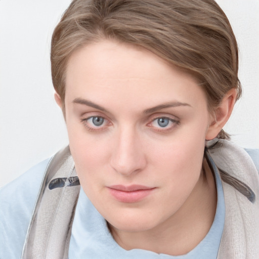 Neutral white young-adult female with medium  brown hair and blue eyes