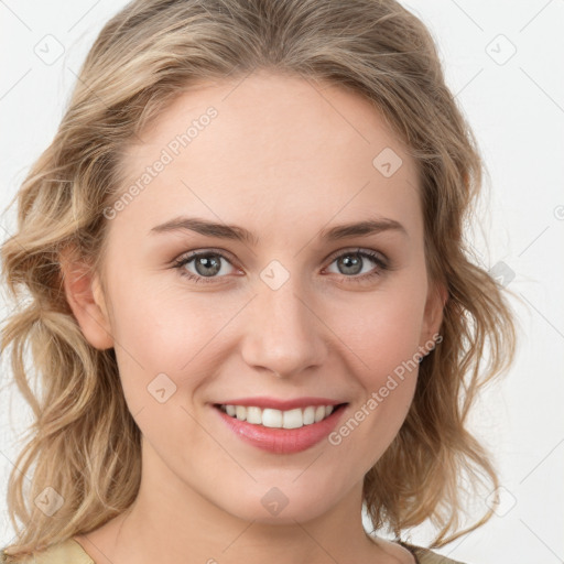 Joyful white young-adult female with medium  brown hair and green eyes