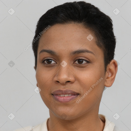 Joyful black young-adult female with short  brown hair and brown eyes