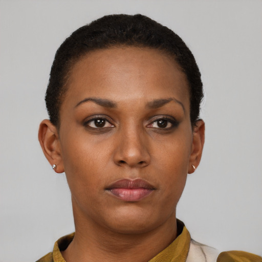 Neutral latino young-adult female with short  brown hair and brown eyes