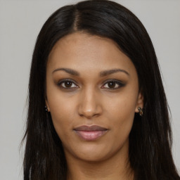 Joyful asian young-adult female with long  brown hair and brown eyes