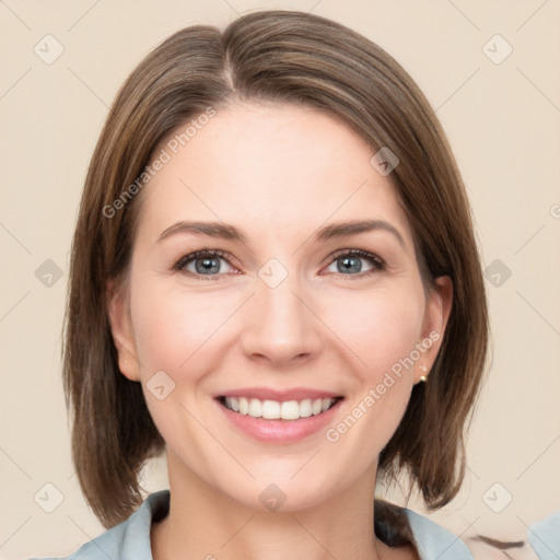 Joyful white young-adult female with medium  brown hair and green eyes