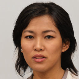 Neutral asian young-adult female with medium  black hair and brown eyes