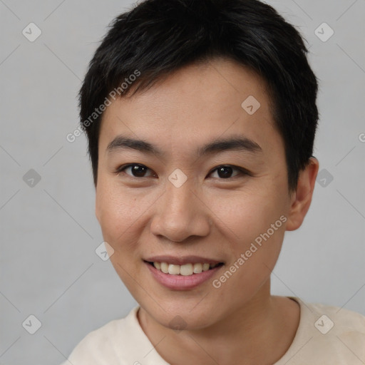 Joyful asian young-adult male with short  black hair and brown eyes