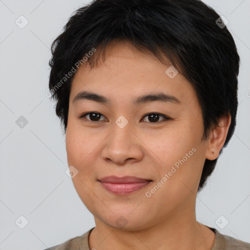 Joyful asian young-adult female with short  brown hair and brown eyes