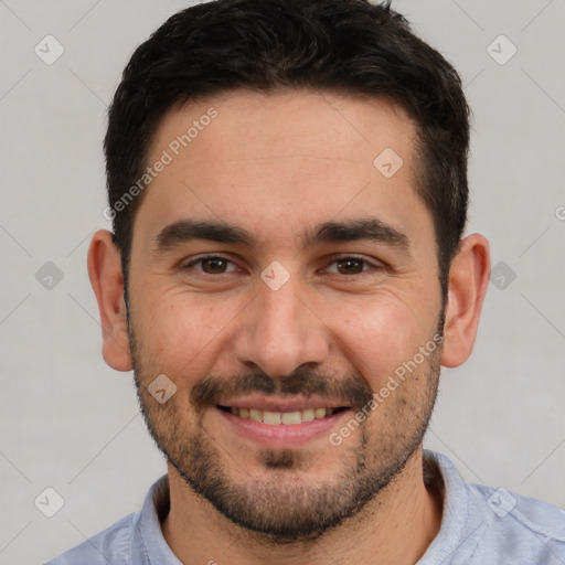 Joyful white young-adult male with short  black hair and brown eyes