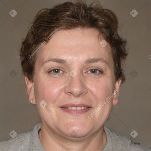 Joyful white adult female with short  brown hair and brown eyes