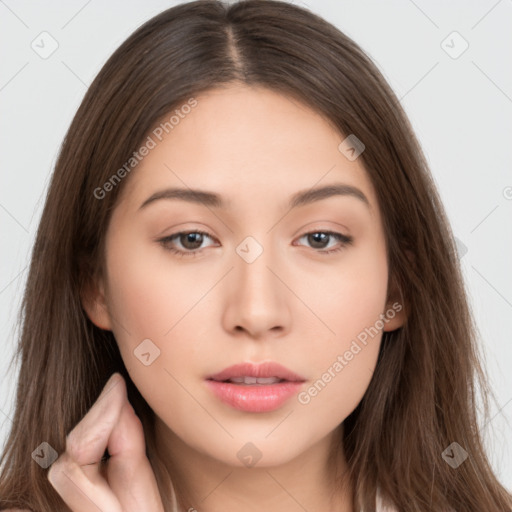 Neutral white young-adult female with long  brown hair and brown eyes