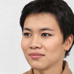 Joyful asian young-adult female with short  brown hair and brown eyes